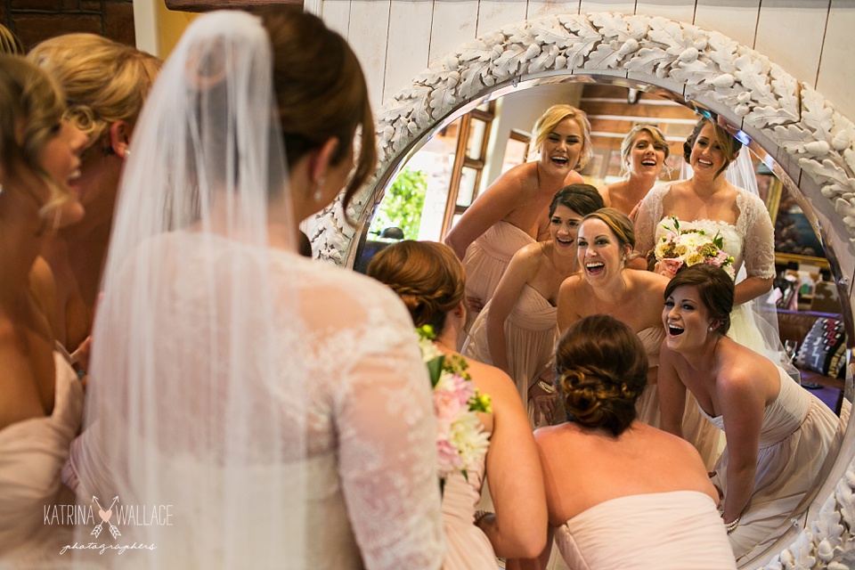 bridal party in a mirror