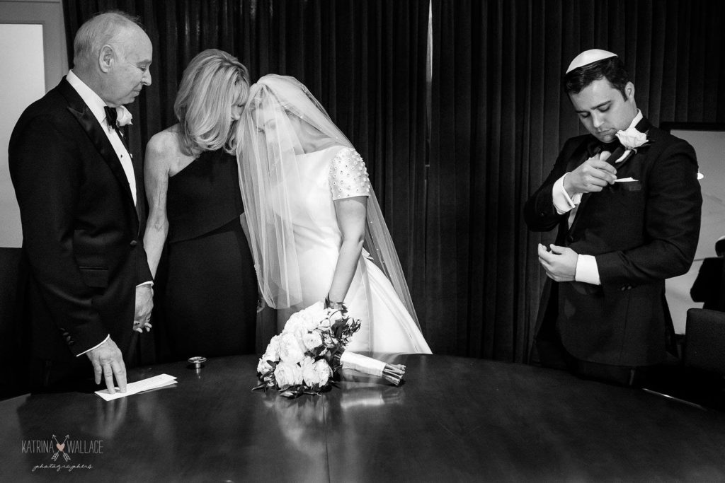 Sanctuary Jewish wedding bride and groom bedekken