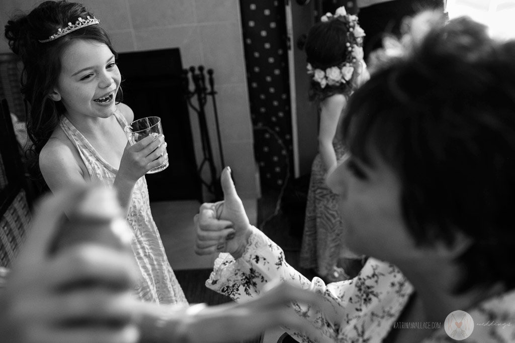 The flower girls during a Brophy Chapel ceremony preparation.