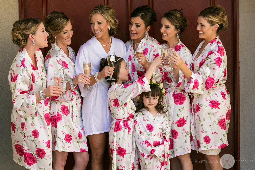 The bridesmaids share some laughs during a quick formal group shot