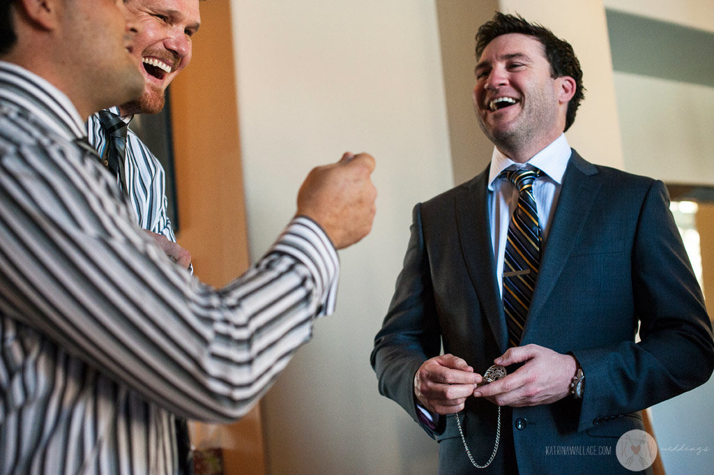 Alex shares a few laughs with his groomsmen before heading over to Brophey Chapel for the wedding ceremony