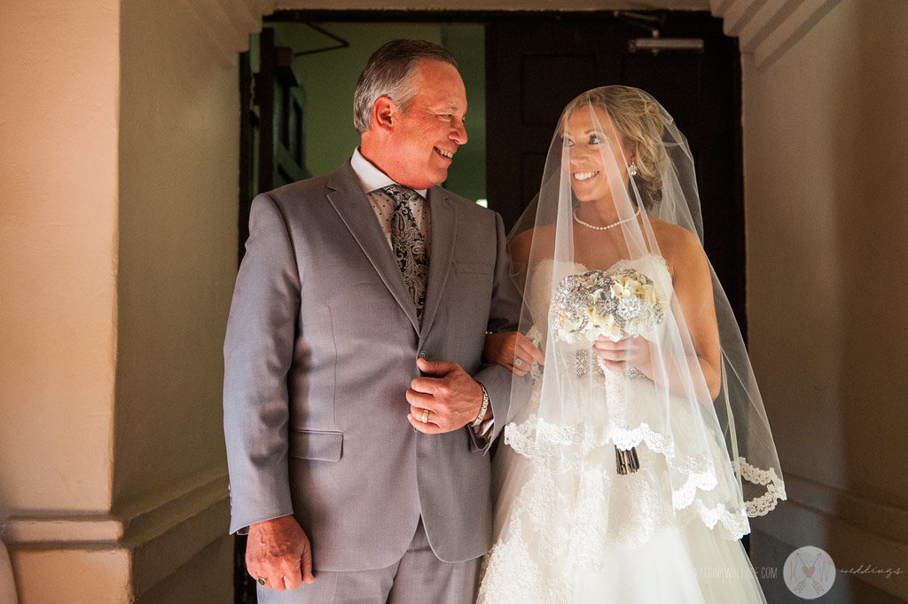 There is almost nothing as sweet as seeing a father and daughter exchange glances before he walks her down the aisle.