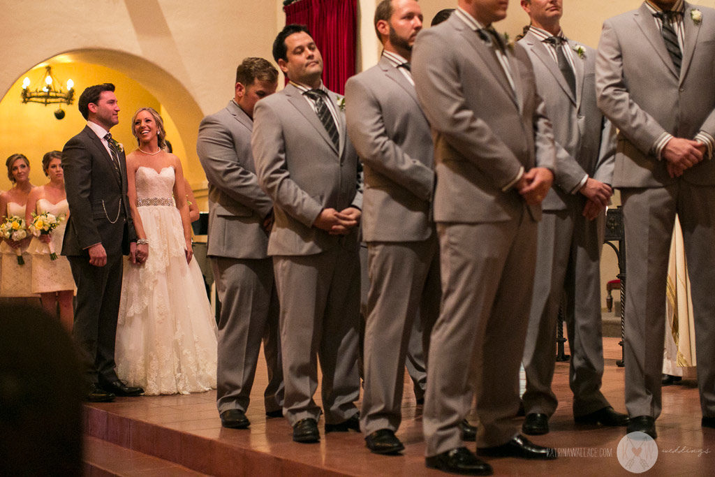 During the Brophey Chapel ceremony the priest directs the group