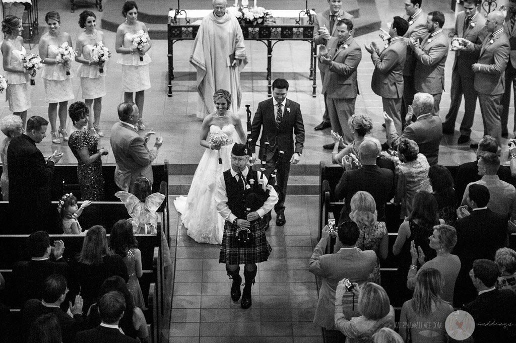 Congratulations to the bride and groom as their Brophey Chapel ceremony ends with the first kiss!