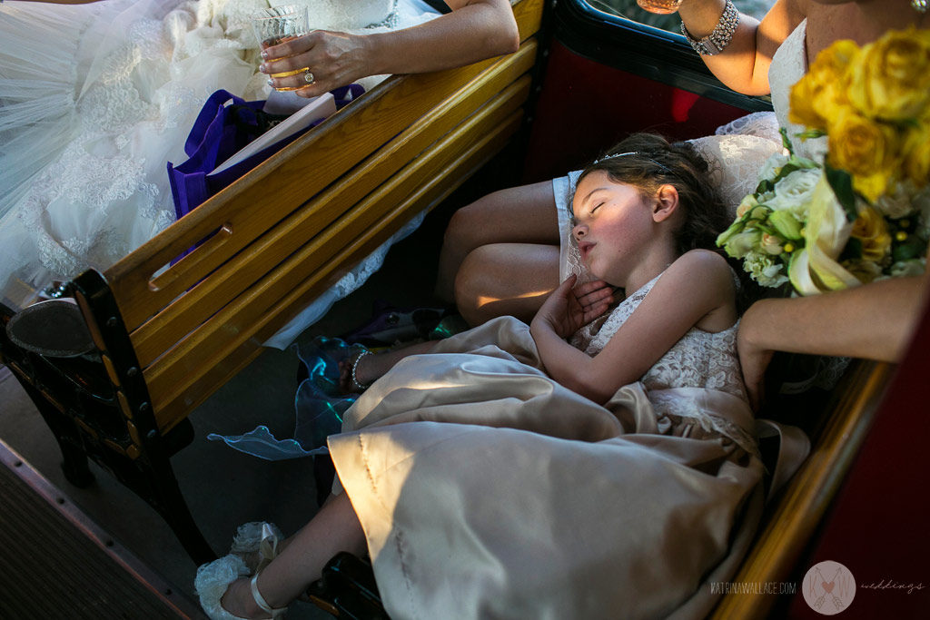 After a long morning of preparation, and a long ceremony at Brophey Chapel, the flower girl takes a nap before the party gets started at El Chorro