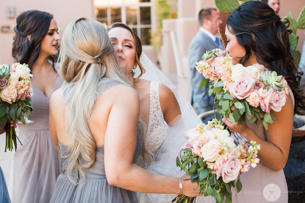 The bride and groom walk down the aisle together after exchanging their vows and a kiss.