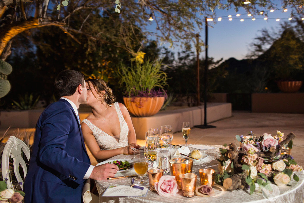 The bride's nephew offers a blessing before dinner gets underway.