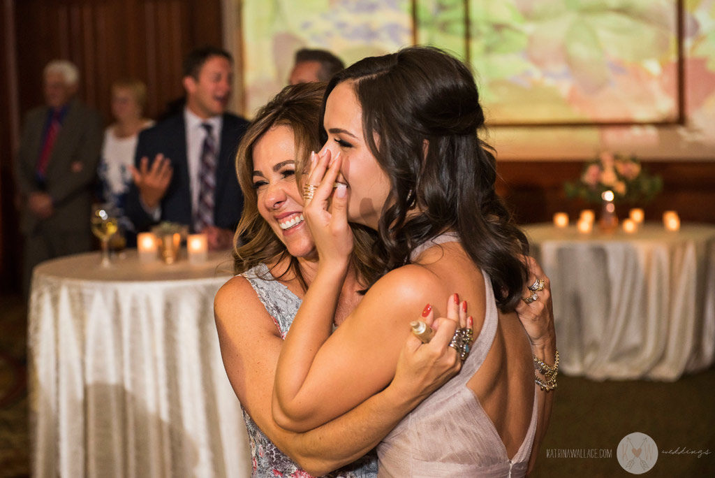 The bride enjoys the first dance with her father.