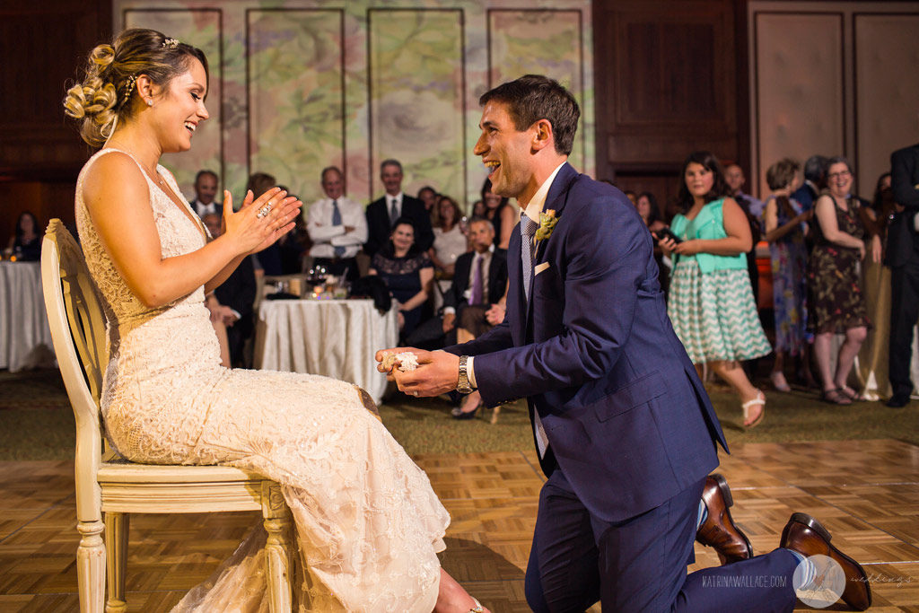 The bride gets ready to throw her bouquet to the single ladies.