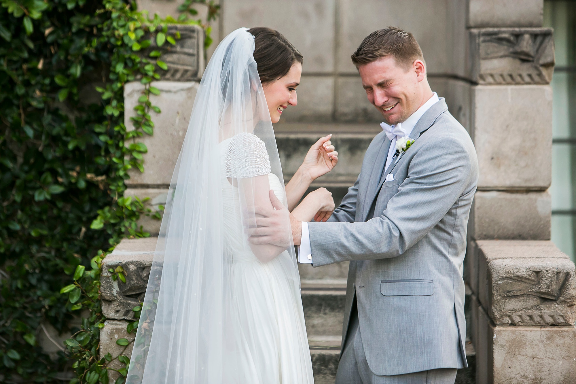 Emotional groom crying during his first look with is bride at an Arizona Biltmore wedding by Victoria Canada Weddings