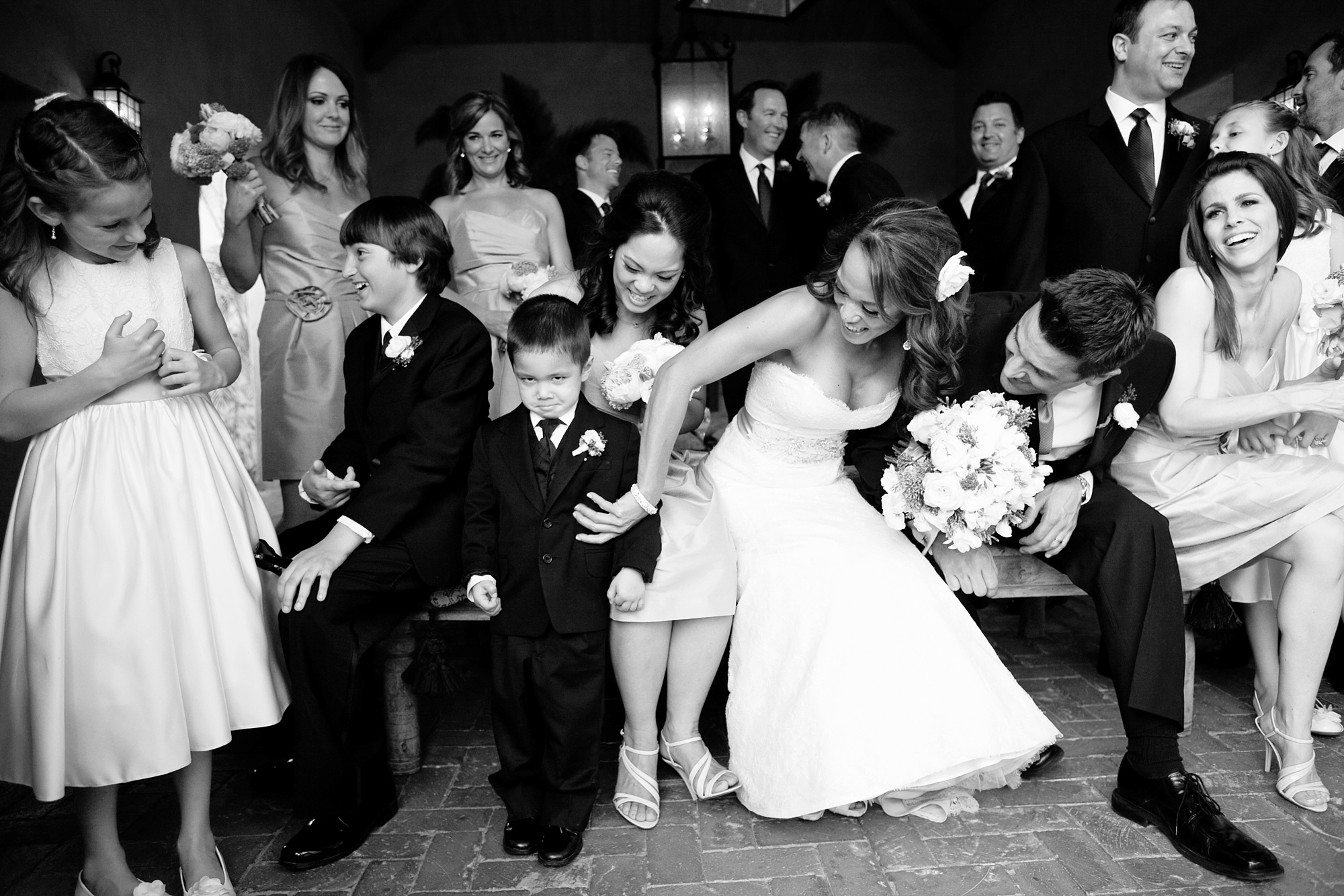 Royal Palms wedding group photo with a kid making a funny face