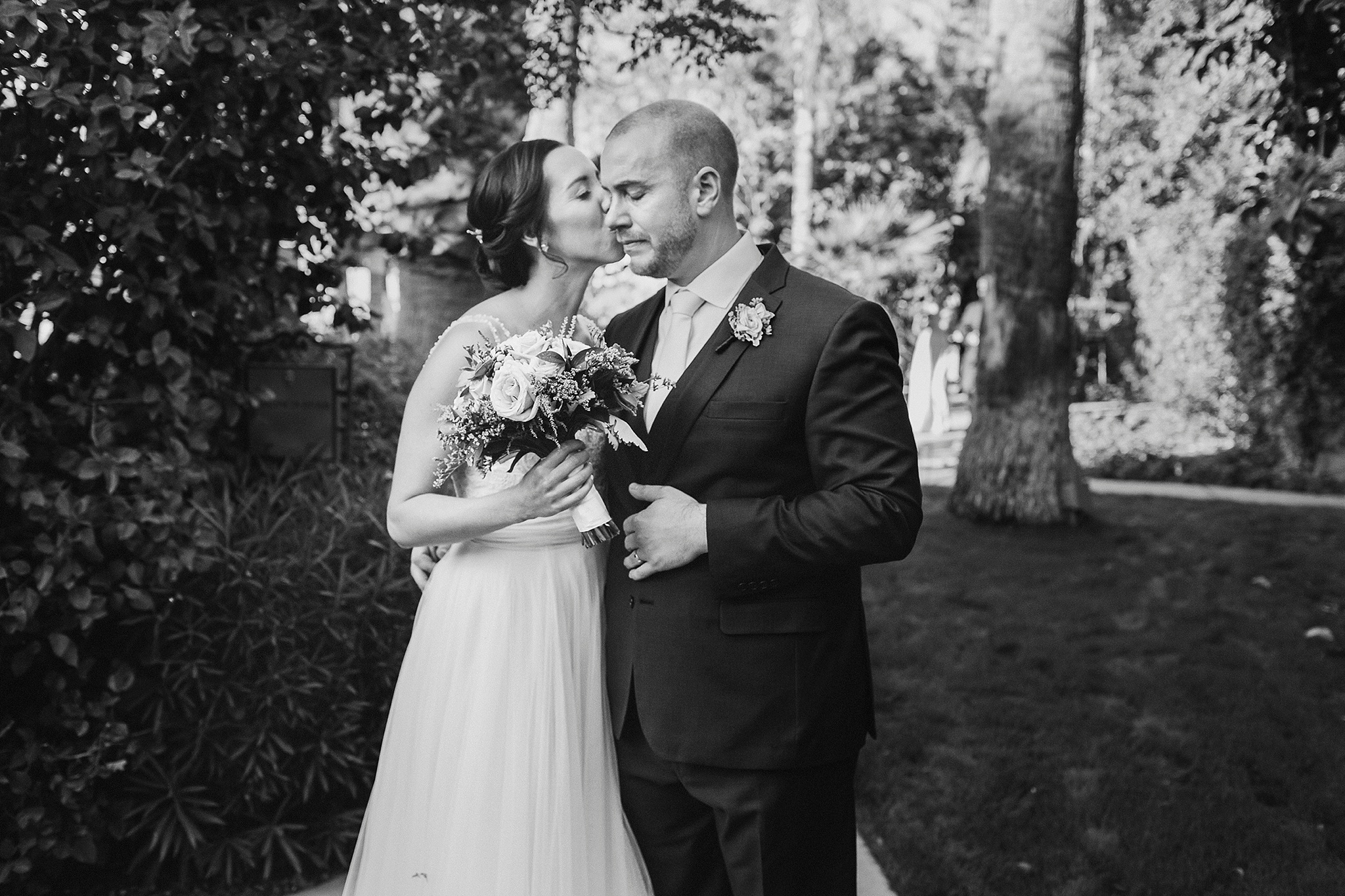 Royal Palms wedding photo with bride and groom emotional after their ceremony