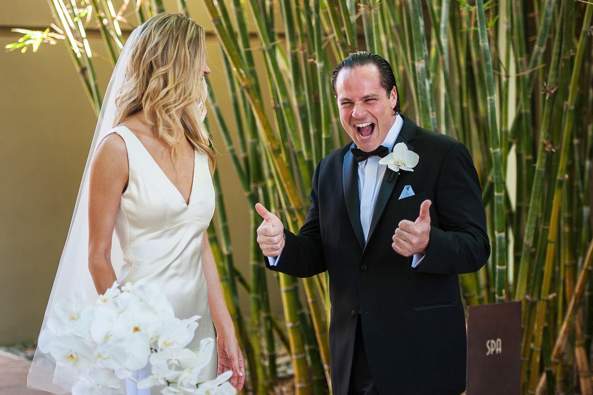 two thumbs up from a groom on his wedding day at Sanctuary Resort